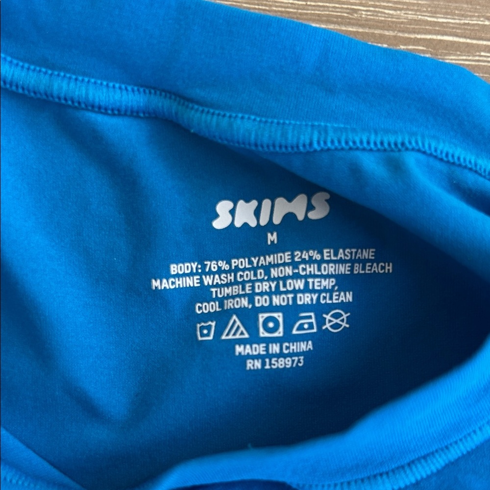 SKIMS Blue and Purple Short Sleeve cropped swim Tees - Picture 6 of 6